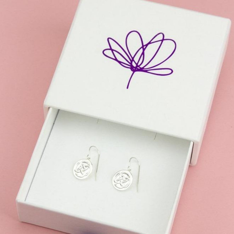 biodegradable packaging with sterling silver drop earrings inside